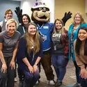 College of Western Idaho Advisors posing with Steelheads Blue Mascot