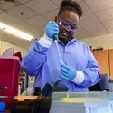 INBRE scholar working in the lab