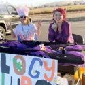 Members of the Biology Club hosting a decorated table at the CWI Trunk-or-Treat Oct. 28.