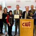 CWI staff members and Trustees pose with Gov. Brad Little during awards presentation