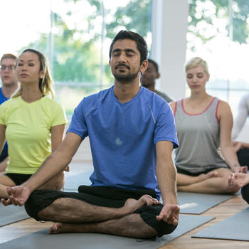 Group of people practicing yoga