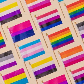 Photo is the cover for the page and has many different pride flags all over it