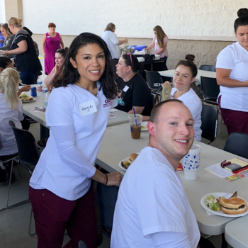 Students attending a barbecue hosted by Saint Alphonsus Aug. 27, 2019