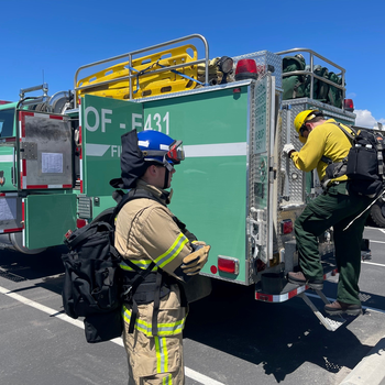 Wildland fire recruits inspect a fire engine on May 26 at CWI.