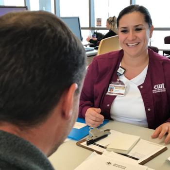 Nursing student registering a student to donate blood during a blood drive