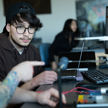 CWI students working on an engineering project