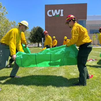Wildland fire recruits training outside the Nampa Campus Academic Building