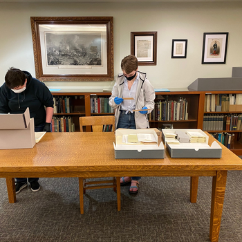 History Capstone class students from CWI searching Idaho State Archives