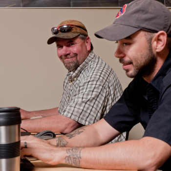 Two students sitting at computers