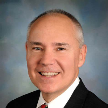 Headshot of Dan Melvin