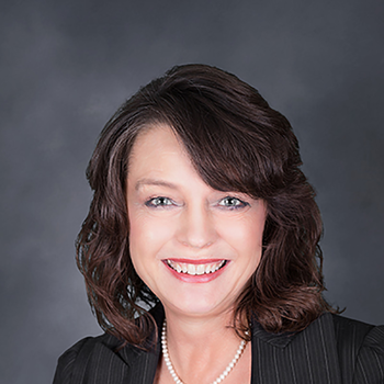 Headshot of Lynda Friesz