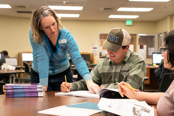 Students and a teacher in the Nampa Adult Education lab