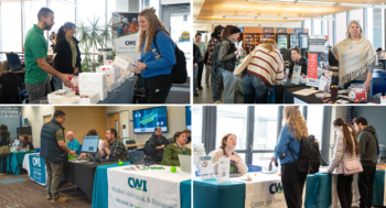 Students engage with college staff at multiple informational tables during a campus resource fair.