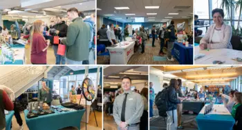 Students engage with employers and campus partners at tables during a college career and networking fair.