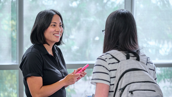 Staff talking with a student