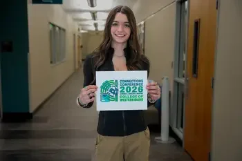 Ayla Taylor holding Connections Conference logo