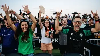 Fans cheering at an AC Boise game