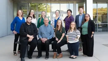 Work-Based Learning Center team posing for a photo outside a campus building