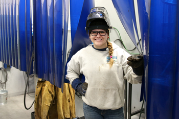 Female student in welding