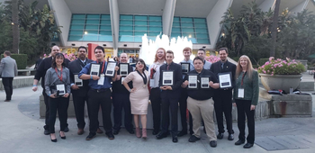 BPA members holding up awards after a competition