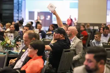 Guests seated at tables at the 2022 Opening Doors Benefit Event