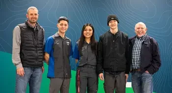 Students and donors line up for a group photo.