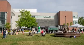 People celebrate an upcoming graduation on the campus of College of Western Idaho.