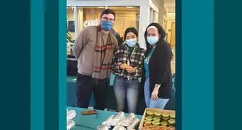 Three employees with masks on