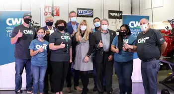 CWI leadership and staff with Opening Doors guests and emcees. 