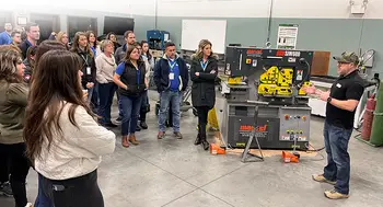 Mike Wheeler leading a tour of the College's Welding lab to members of Leadership Nampa