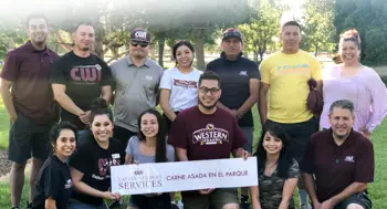Students and staff gather at Carne Asada en el Parque Wednesday, June 19, 2019.