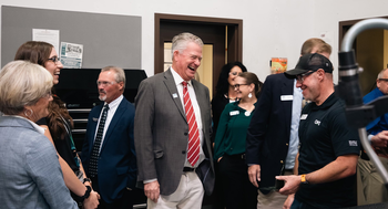 Governor Little chatting with instructors