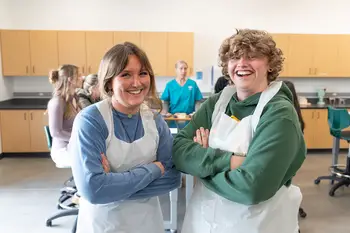 Two students in a science lab