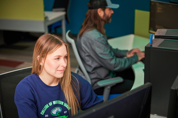 Students working on computer.