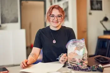Art student drawing in classroom