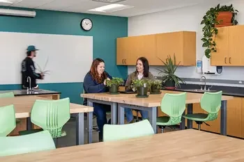 Students working with plants in classroom 
