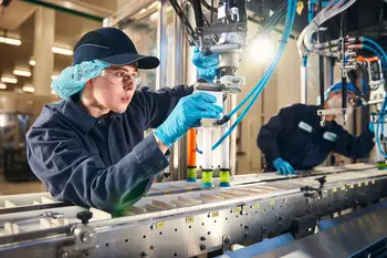 Student working with Mechatronics equipment