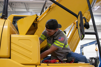 CWI Student working on a piece of heavy equipment