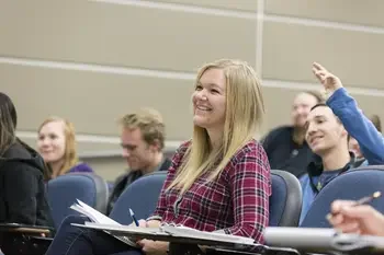 Students smiling in a classroom