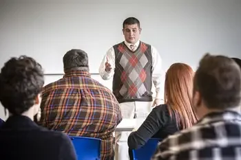 CWI student speaking in front of a class