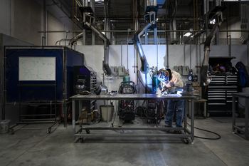 Welding student working in lab