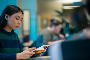 Student reading a book.