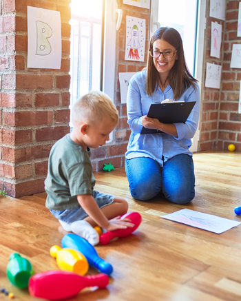 Social Worker interacting with a preschool child