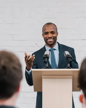 Politician smiling at crowd