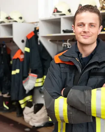 Person standing in firefighter gear