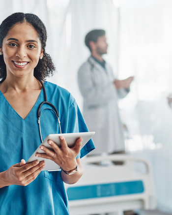 Medical Assistant working in lab with doctors