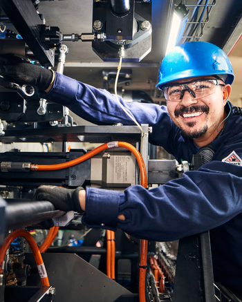 Guy working on Mechatronic equipment
