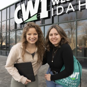 Two female students outside the APIN building