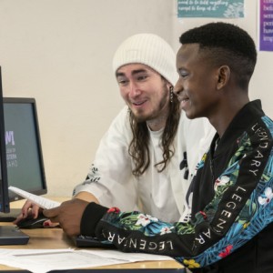 students working on computer