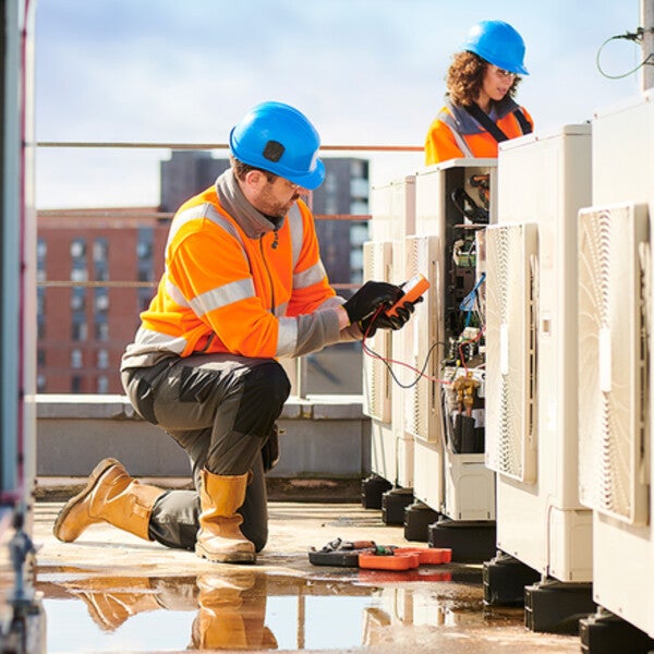 HVAC apprentice learning on the job.
